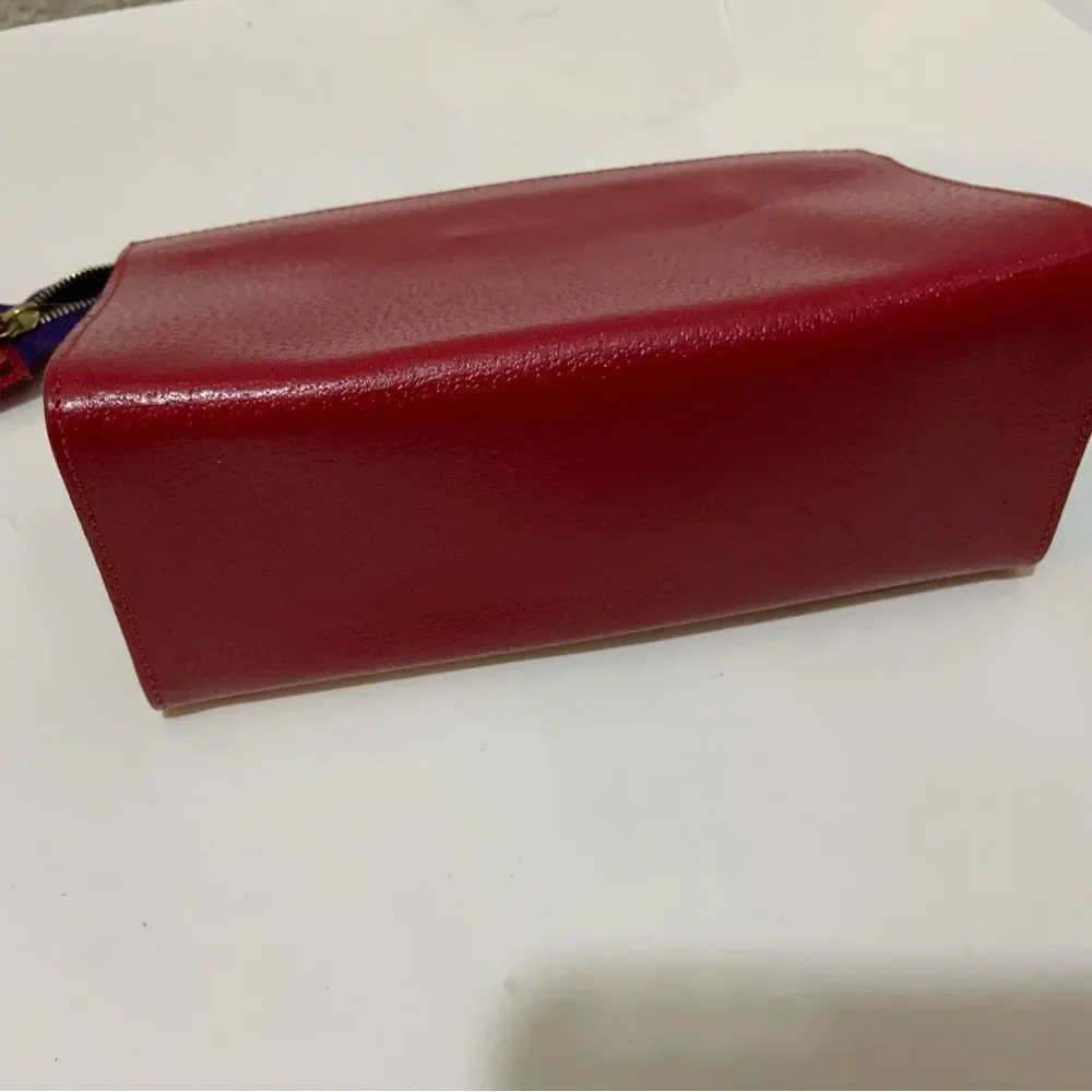 NWOT Aspinal of London red reptile cosmetic case.